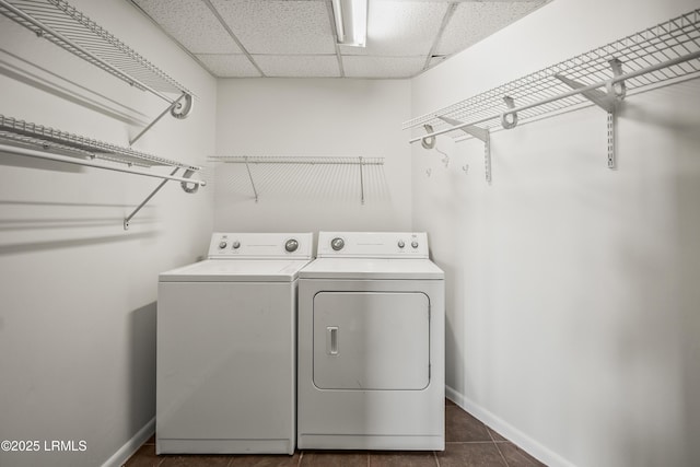 1203 Laudonniere St, Beaufort, SC 29902 - laundry room with washer and dryer and dark tile patterned flooring