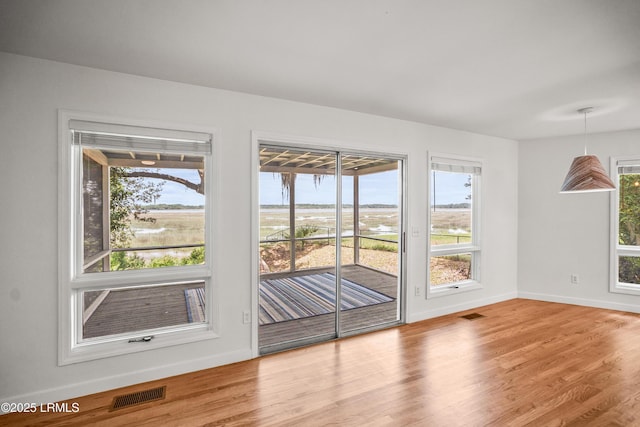 1203 Laudonniere St, Beaufort, SC 29902 - unfurnished room featuring baseboards and wood finished floors