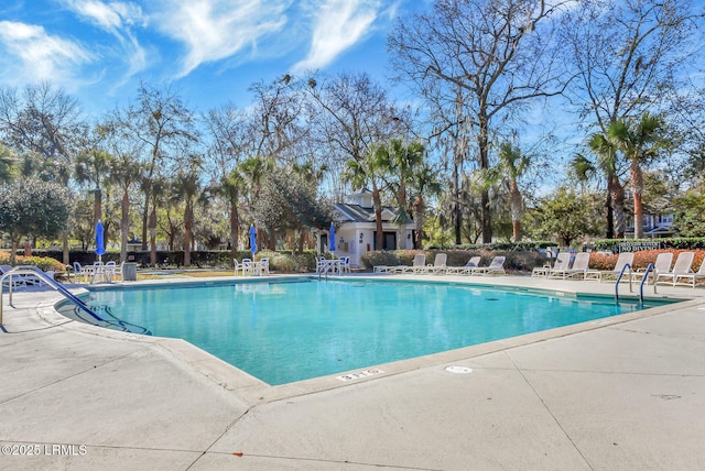 view of swimming pool featuring a patio