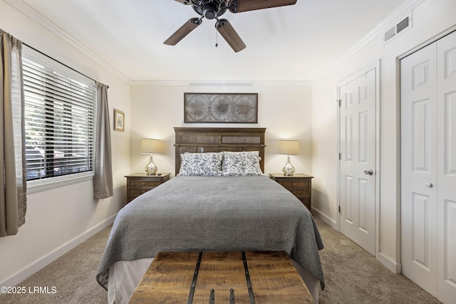 bedroom featuring carpet floors, visible vents, and crown molding