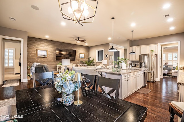 15 Carter Oaks Dr, Beaufort, SC 29907 - dining space featuring dark hardwood / wood-style flooring, sink, and ceiling fan with notable chandelier