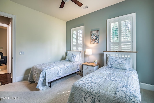 15 Carter Oaks Dr, Beaufort, SC 29907 - bedroom with ceiling fan, carpet floors, and multiple windows