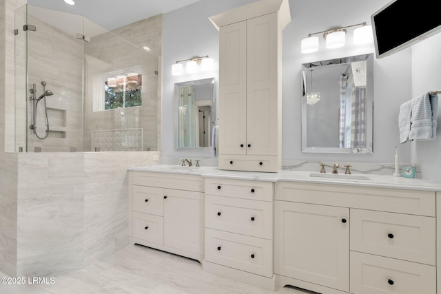 bathroom featuring vanity and walk in shower