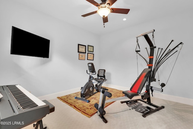 exercise area with carpet and ceiling fan