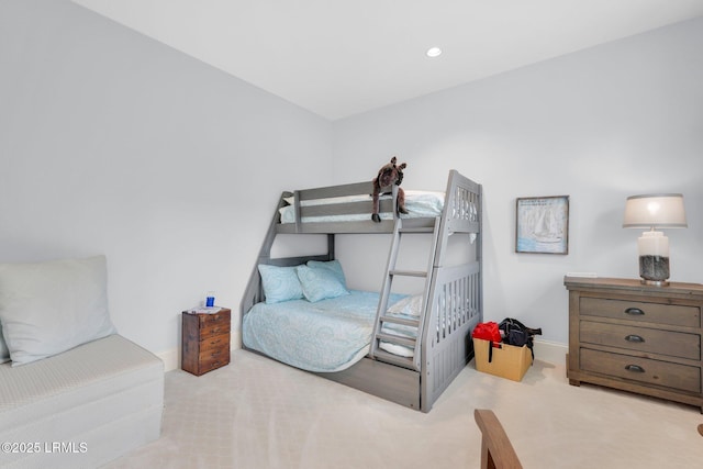 bedroom featuring light colored carpet