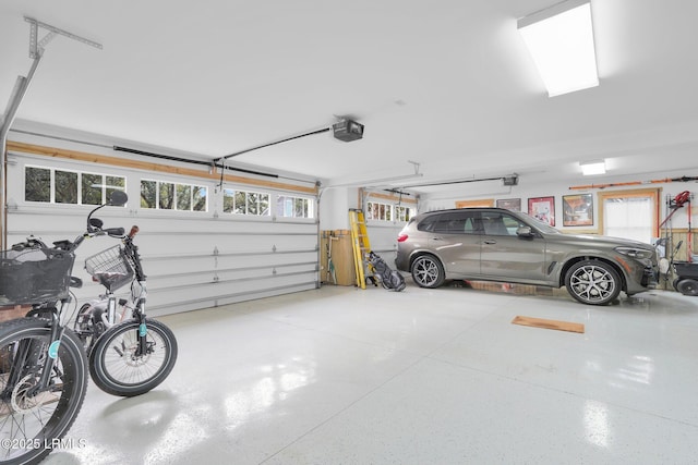 garage featuring a garage door opener