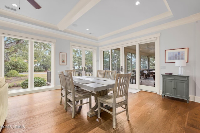 dining space with hardwood / wood-style floors, french doors, and ceiling fan