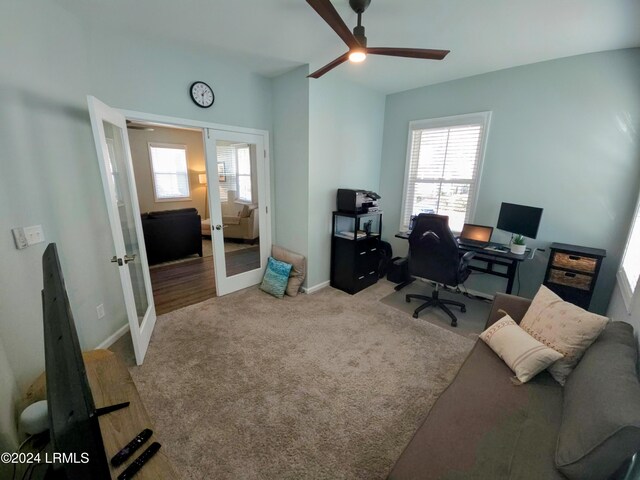 home office featuring light colored carpet and french doors