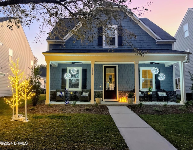 2708 Satilla Blvd, Beaufort, SC 29902 - craftsman inspired home featuring covered porch, a front lawn, and stone siding