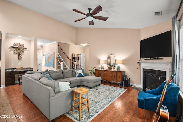 12 Catawba Way, Beaufort, SC 29906 - living area with ceiling fan, a fireplace with flush hearth, stairway, wood finished floors, and vaulted ceiling