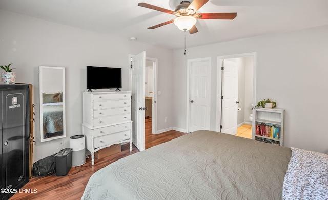 27 Tulifinny Ln, Yemassee, SC 29945 - bedroom with wood finished floors, ensuite bath, and a ceiling fan
