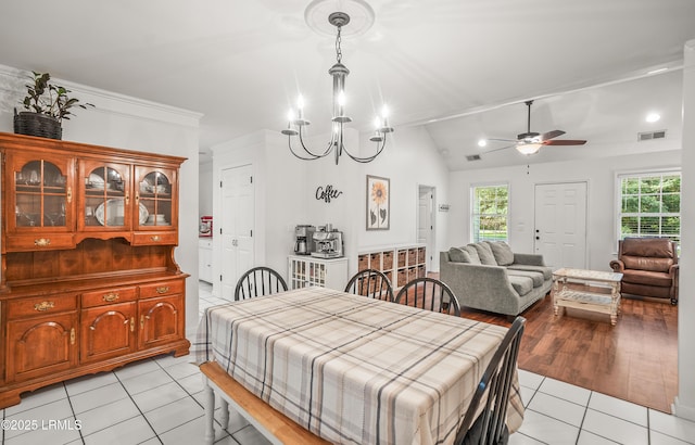 27 Tulifinny Ln, Yemassee, SC 29945 - dining area with light tile patterned floors, healthy amount of natural light, a ceiling fan, a chandelier, and lofted ceiling