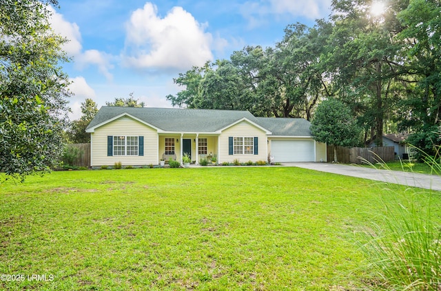 27 Tulifinny Ln, Yemassee, SC 29945 - ranch-style house featuring concrete driveway, an attached garage, and covered porch