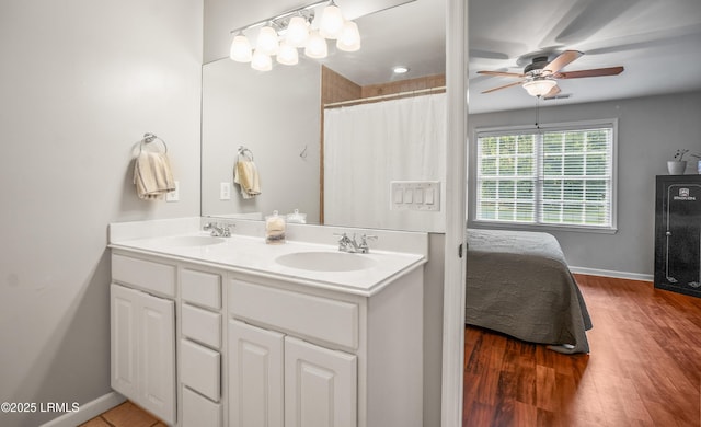 27 Tulifinny Ln, Yemassee, SC 29945 - ensuite bathroom with double vanity, a ceiling fan, and wood finished floors
