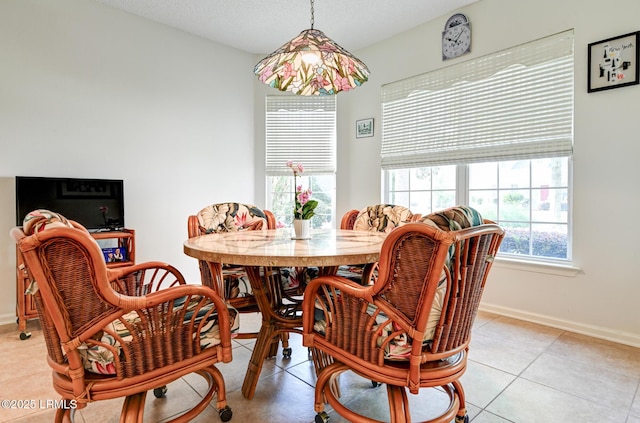 21 Raven Glass Ln, Bluffton, SC 29909 - dining area with baseboards and light tile patterned floors