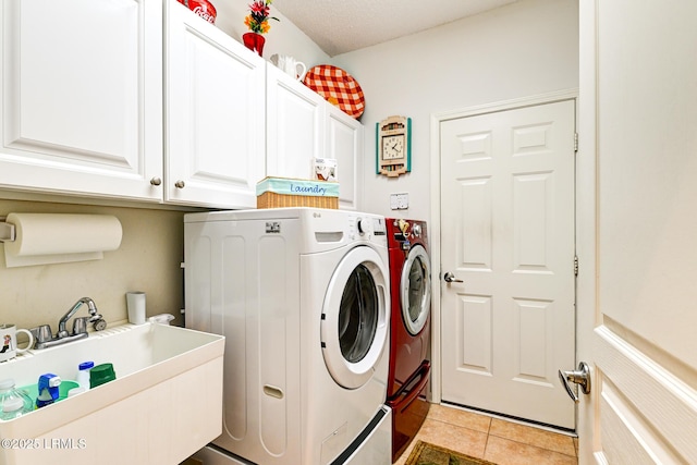 21 Raven Glass Ln, Bluffton, SC 29909 - laundry room featuring cabinet space, washer and clothes dryer, and light tile patterned floors