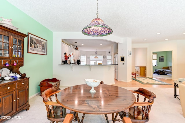 21 Raven Glass Ln, Bluffton, SC 29909 - dining room featuring a textured ceiling and recessed lighting