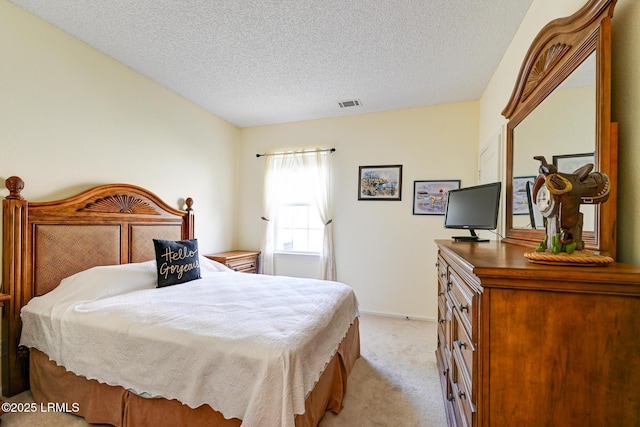 21 Raven Glass Ln, Bluffton, SC 29909 - bedroom featuring light carpet, a textured ceiling, and baseboards