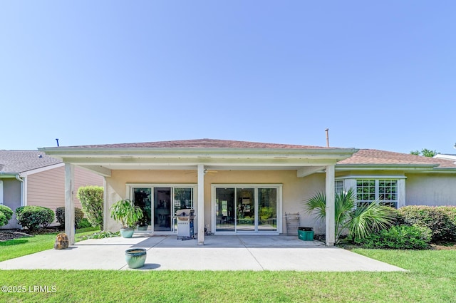 21 Raven Glass Ln, Bluffton, SC 29909 - back of house featuring ceiling fan, a patio, and a lawn