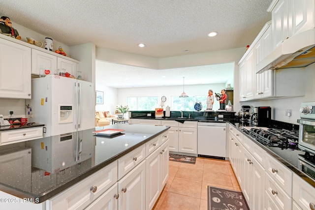 21 Raven Glass Ln, Bluffton, SC 29909 - kitchen with white appliances, recessed lighting, white cabinets, a textured ceiling, and a sink
