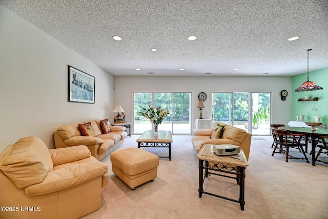 21 Raven Glass Ln, Bluffton, SC 29909 - living area featuring light colored carpet, recessed lighting, and a textured ceiling