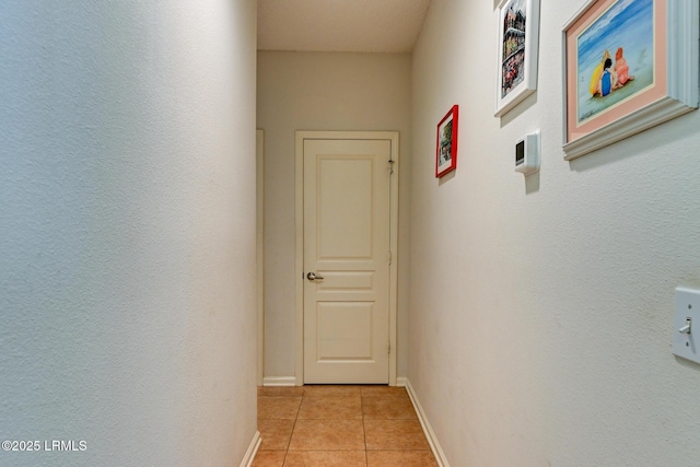 21 Raven Glass Ln, Bluffton, SC 29909 - corridor with light tile patterned floors and baseboards