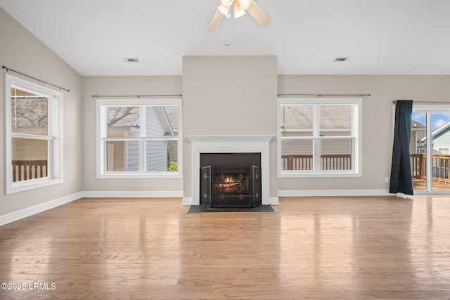 unfurnished living room with light hardwood / wood-style floors and ceiling fan