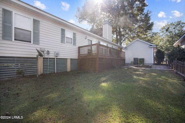 view of yard with a wooden deck