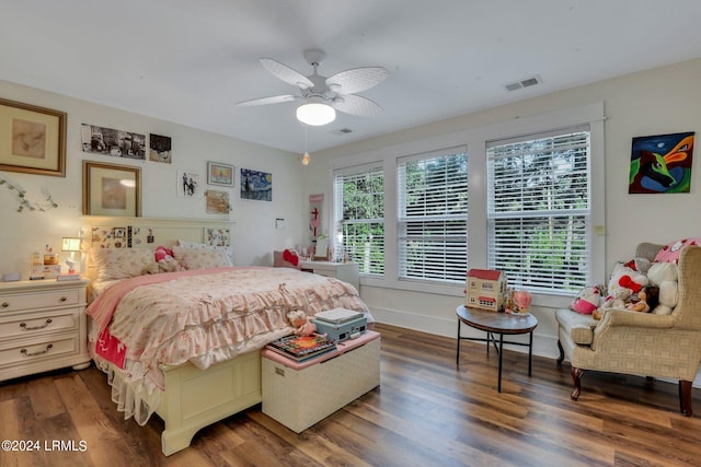 bedroom with dark wood-type flooring and ceiling fan