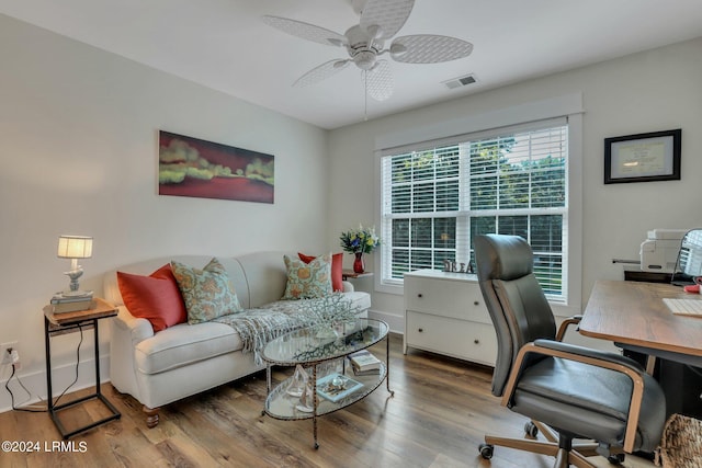 office space featuring hardwood / wood-style flooring and ceiling fan