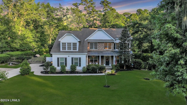 view of front facade with a lawn