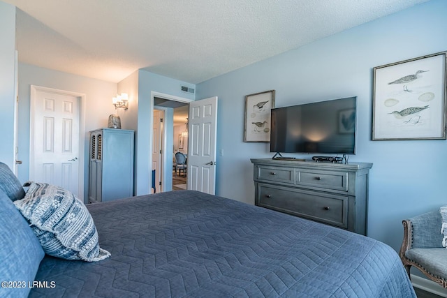 bedroom with a textured ceiling