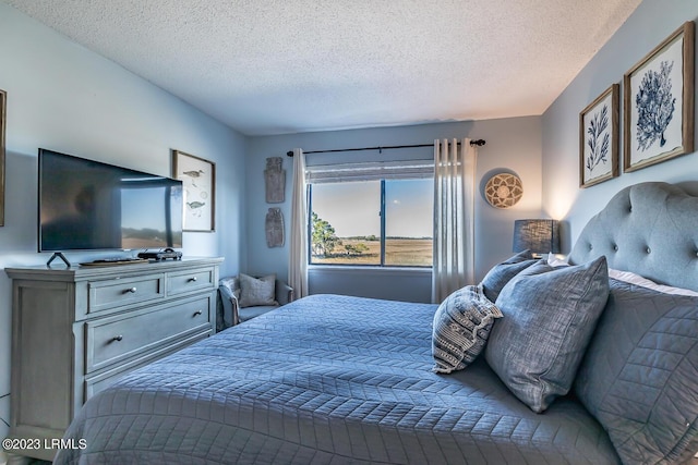 bedroom with a textured ceiling