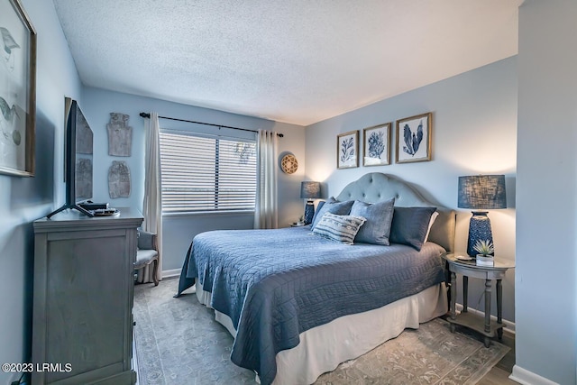 bedroom featuring a textured ceiling