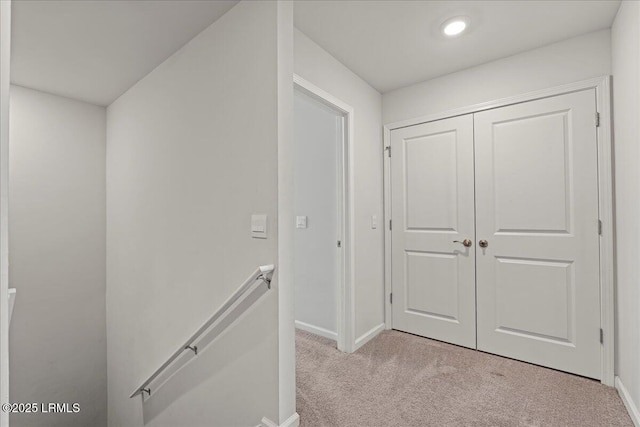 86 Slater St, Bluffton, SC 29909 - hallway featuring an upstairs landing, light carpet, and recessed lighting