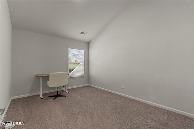 86 Slater St, Bluffton, SC 29909 - carpeted home office with vaulted ceiling and baseboards