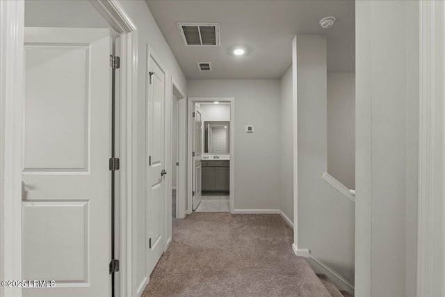 86 Slater St, Bluffton, SC 29909 - hallway featuring light carpet and baseboards