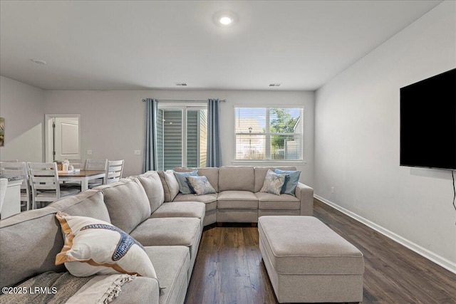 86 Slater St, Bluffton, SC 29909 - living room with baseboards and dark wood finished floors