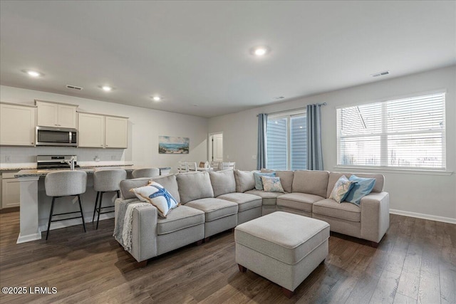 86 Slater St, Bluffton, SC 29909 - living area featuring dark wood-style floors and recessed lighting