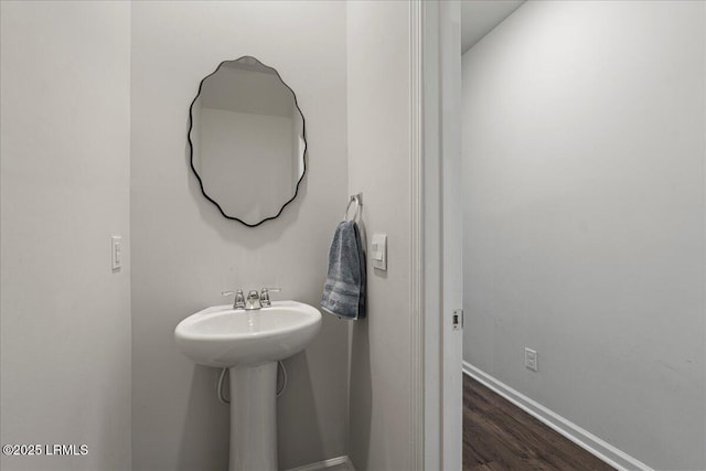 86 Slater St, Bluffton, SC 29909 - bathroom with wood finished floors and baseboards