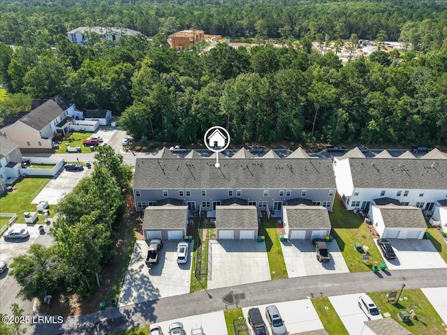 86 Slater St, Bluffton, SC 29909 - aerial perspective of suburban area with a heavily wooded area