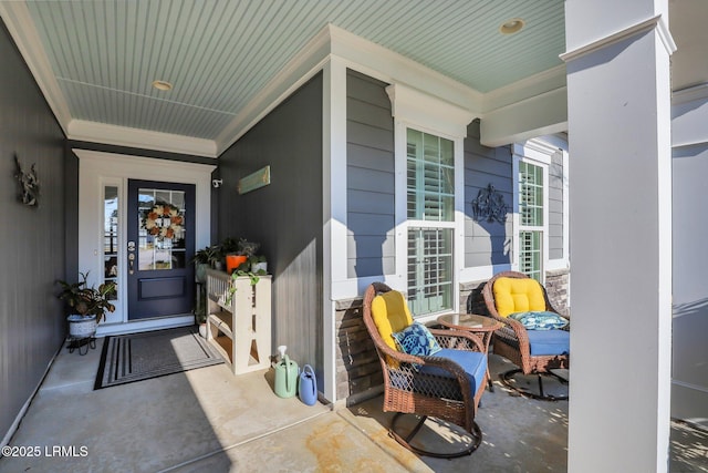 property entrance with stone siding and covered porch