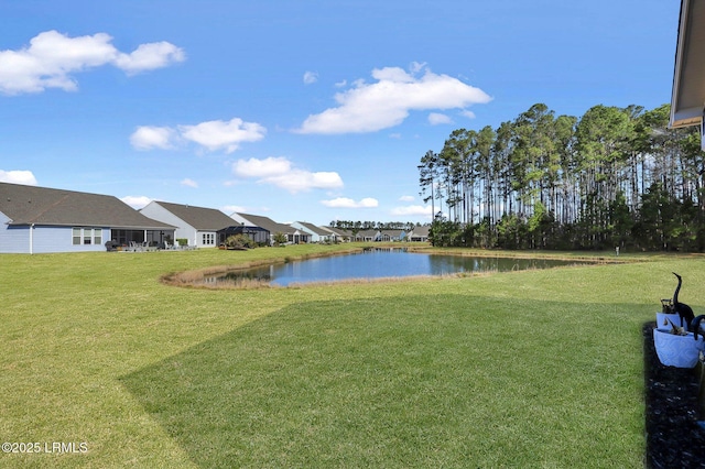 view of yard with a water view