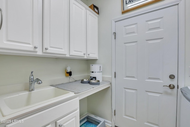 laundry area featuring a sink