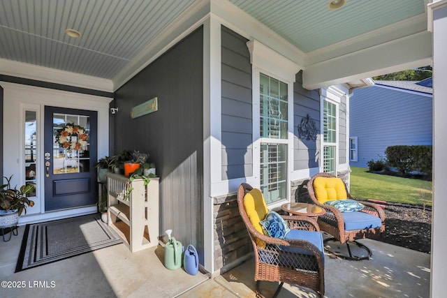 entrance to property with covered porch