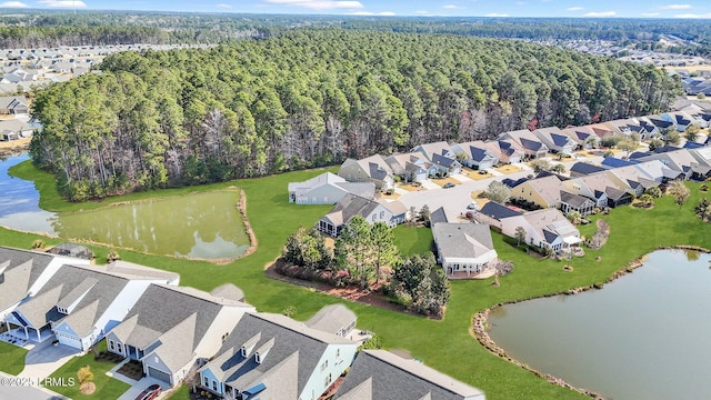 bird's eye view with a residential view, a forest view, and a water view