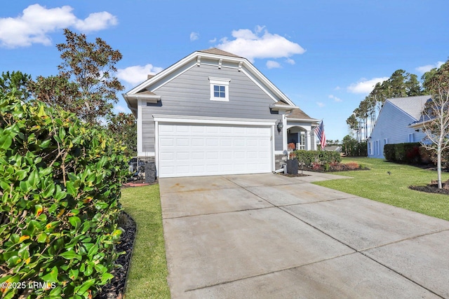 view of front of property featuring stone siding, driveway, and a front yard