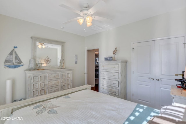 bedroom featuring a ceiling fan and a closet