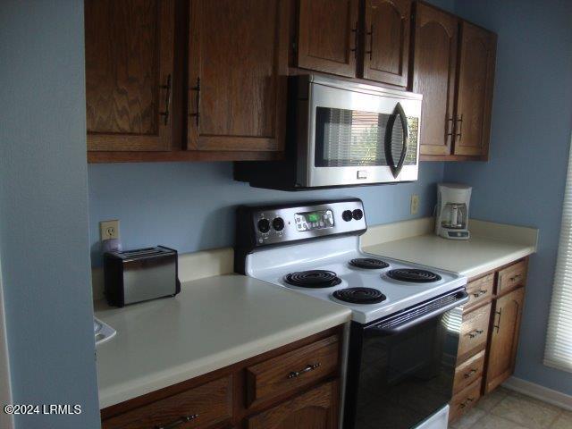 kitchen featuring electric range oven