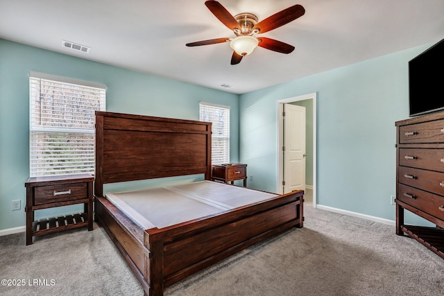 bedroom with a ceiling fan, baseboards, visible vents, and carpet flooring